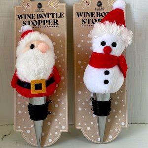 Adorable wine bottle stoppers. One Santa and a Snowman!  Beautiful faces!